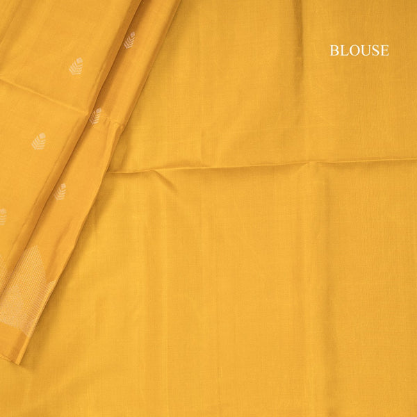 Mustard Soft Silk Saree With Tiny Buttis On Body And Stylish Border