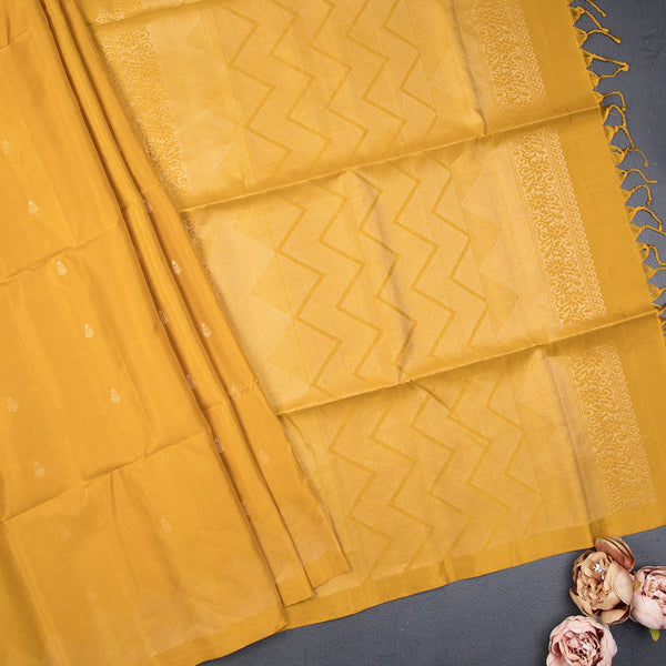 Mustard Soft Silk Saree With Tiny Buttis On Body And Stylish Border