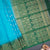 Rama Blue Soft Silk Saree With Tiny Buttis On Body And Green Leaves Patterned Border