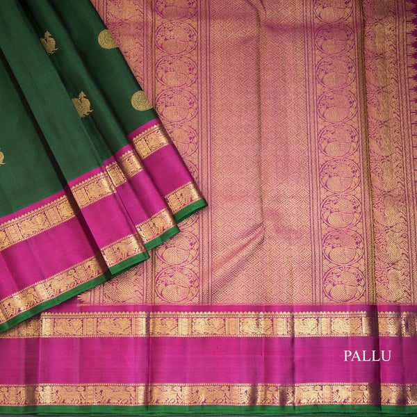 Bottle Green Silk Saree With Peacock And Chakra Buttas And Rettapet Border
