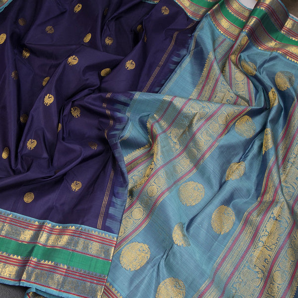 Dark Blue Silk Saree With Peacock And Chakra Buttas And Rettapet Border