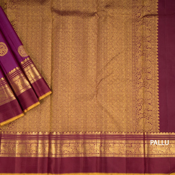 Magenta Silk Saree With Animal Motif On The Body And Zari With Thread Embossed Border