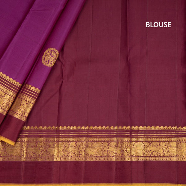 Magenta Silk Saree With Animal Motif On The Body And Zari With Thread Embossed Border