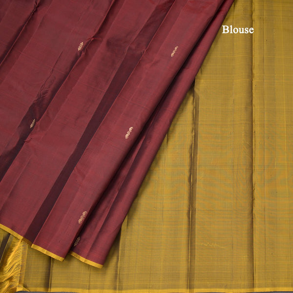 Maroon Borderless Silk Saree With Floral Zari Buttas On The Body