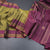 Olive Green Silk Saree With Chakra Buttas And Stripes Border