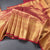 Maroon Tissue Silk Saree With Gold Zari Border