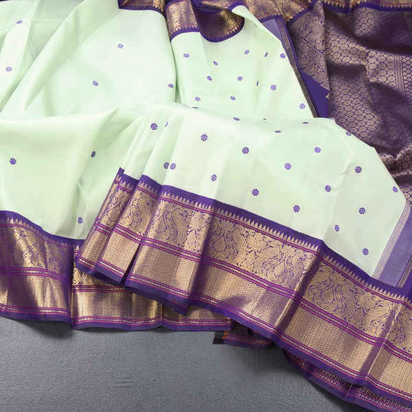 Pista Green Silk Saree With Thread Buttas And Temple Zari Border