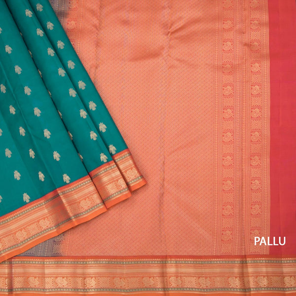 Peacock Green Soft Silk Saree With Peacock Buttas On The Body And Orange Zari Border