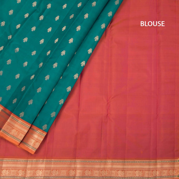 Peacock Green Soft Silk Saree With Peacock Buttas On The Body And Orange Zari Border