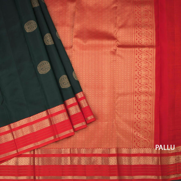 Bottle Green Silk Saree With Chakra Buttas On The Body And Red Zari Border