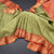 Pista Green Soft Silk Saree With Peacock Buttas On The Body And Orange Zari Border