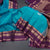 Peacock Blue Silk Saree With Chakra Buttas On The Body And Purple Zari Border