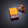 Mango Yellow Soft Silk Saree With Peacock Buttas On The Body And Purple Zari Border