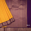 Mango Yellow Soft Silk Saree With Peacock Buttas On The Body And Purple Zari Border