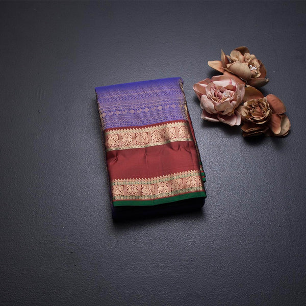 Indigo Blue Soft Silk Saree With Multi Design On The Body And Rettapet Border