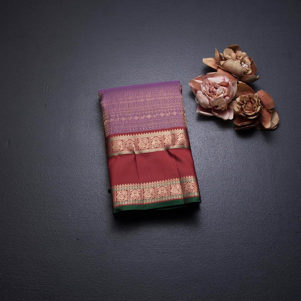 Dark Purple Soft Silk Saree With Multi Design On The Body And Rettapet Border
