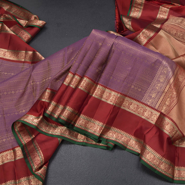Dark Purple Soft Silk Saree With Multi Design On The Body And Rettapet Border