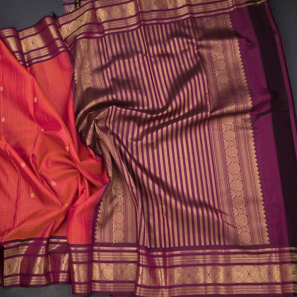 Shot Colour Checked Silk Saree With Peacock And Chakra Buttas And Zari Border