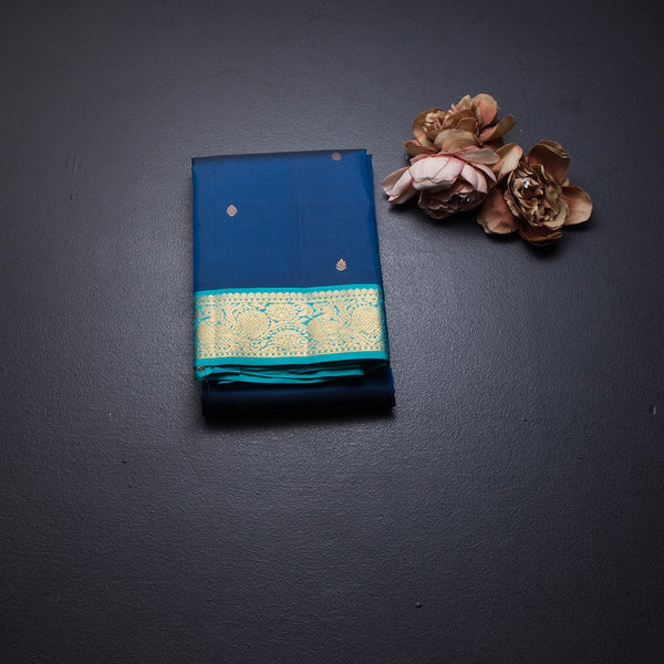 Peacock Blue Silk Saree With Small Buttas And Gold Zari Border