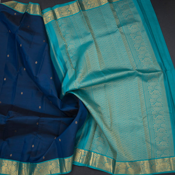 Peacock Blue Silk Saree With Small Buttas And Gold Zari Border