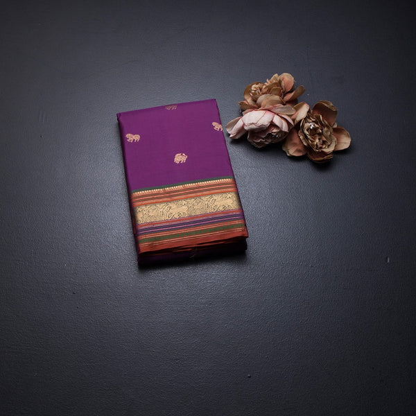 Purple Silk Saree With Animal Buttas On The Body And Zari Border