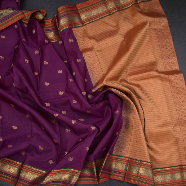 Purple Silk Saree With Animal Buttas On The Body And Zari Border