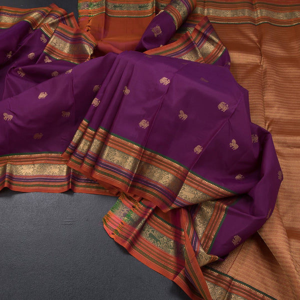 Purple Silk Saree With Animal Buttas On The Body And Zari Border