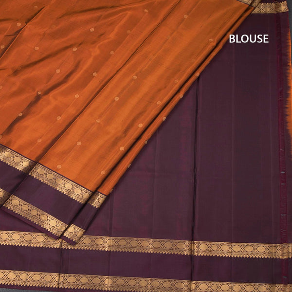 Rust Orange Soft Silk Saree With Chakra Buttas And Rettapet Border