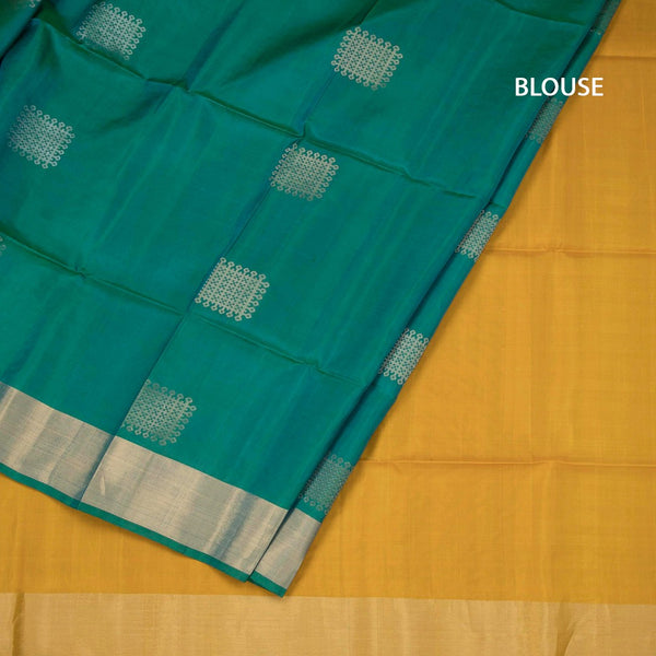 Shot Colour Soft Silk Saree With Zari Work On The Body And Zari Border