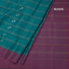 Peacock Blue Soft Silk Saree With Checks Design And Simple Border