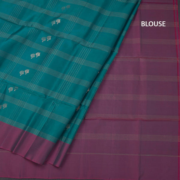 Peacock Blue Soft Silk Saree With Checks Design And Simple Border