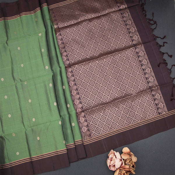 Parrot Green Soft Silk Saree With Chakra Buttas And Simple border