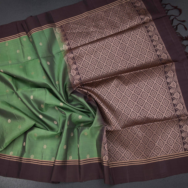 Parrot Green Soft Silk Saree With Chakra Buttas And Simple border