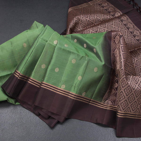 Parrot Green Soft Silk Saree With Chakra Buttas And Simple border