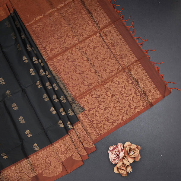 Black Soft Silk Saree With Floral Buttas And Paisley Border
