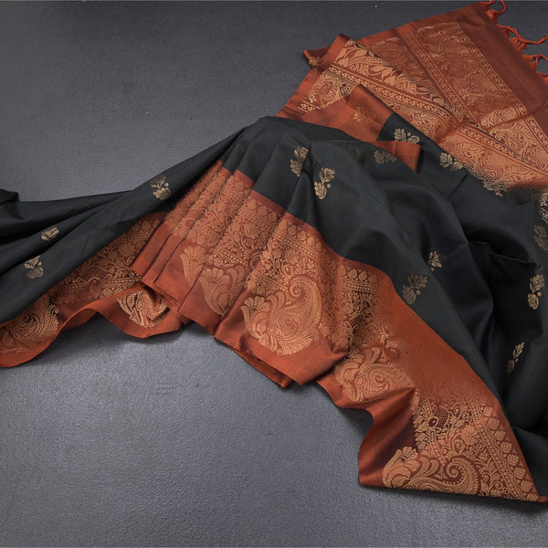 Black Soft Silk Saree With Floral Buttas And Paisley Border
