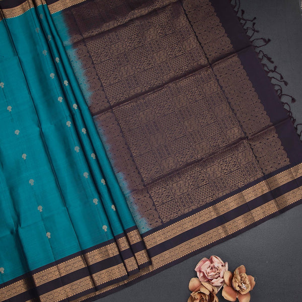 Peacok Blue Soft Silk Saree With Small Buttas And Rettapet Border