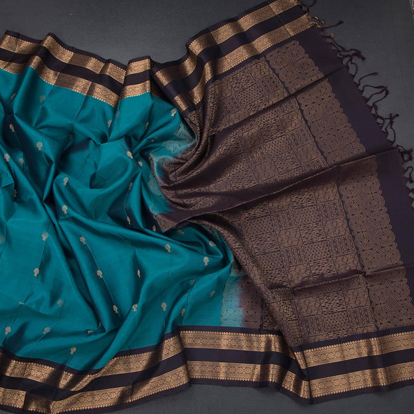 Peacok Blue Soft Silk Saree With Small Buttas And Rettapet Border