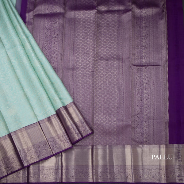 Powder Blue Brocade Silk Saree With Zari Border