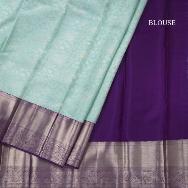 Powder Blue Brocade Silk Saree With Zari Border