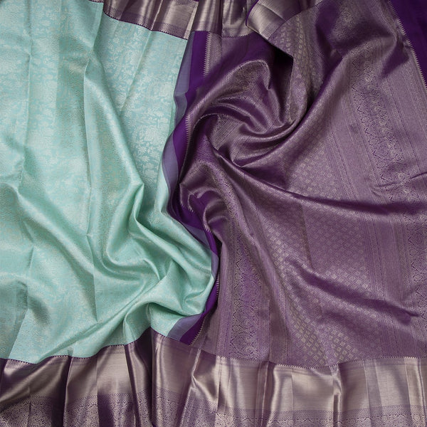 Powder Blue Brocade Silk Saree With Zari Border