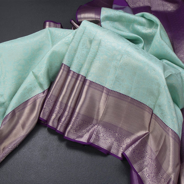 Powder Blue Brocade Silk Saree With Zari Border