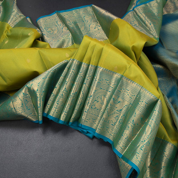 Shot Colour Zari Stripes Silk Saree With Small Buttas And Zari Border