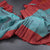 Shot Colour Silk Saree With Chakra Buttas And Checked Zari Border