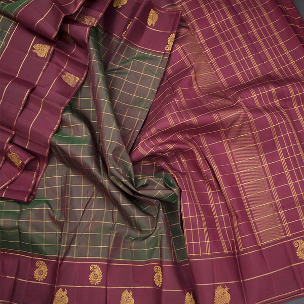 Shot Colour Checked Silk Saree And Peacock And Mango Buttas On Border