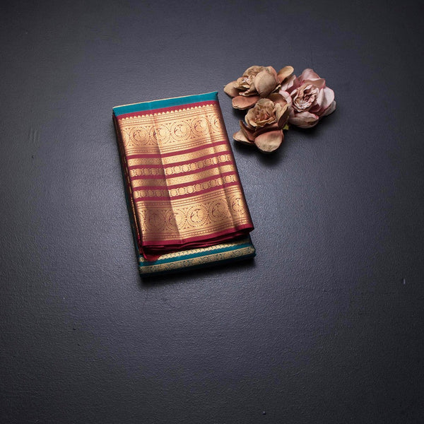 Peacock Green Silk Saree With Stripes Multi Design And Red Zari Border