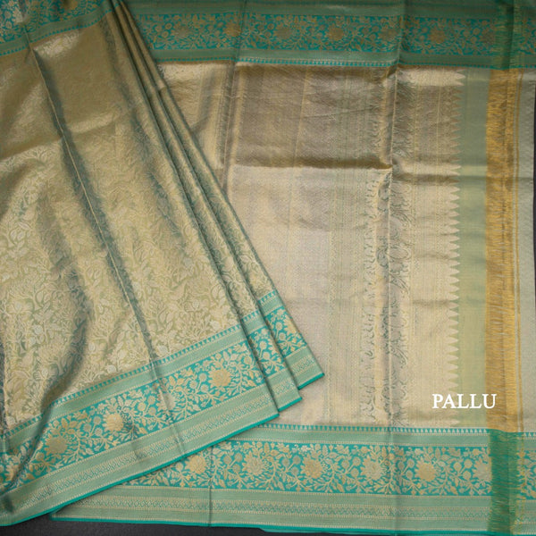 Sea Green Tissue Silk Saree With Floral And Birds Motif And Temple Border