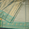 Sea Green Tissue Silk Saree With Floral And Birds Motif And Temple Border