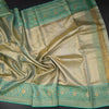 Sea Green Tissue Silk Saree With Floral And Birds Motif And Temple Border