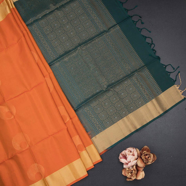Fanta Orange Soft Silk Saree With Oval Design And Zari Border